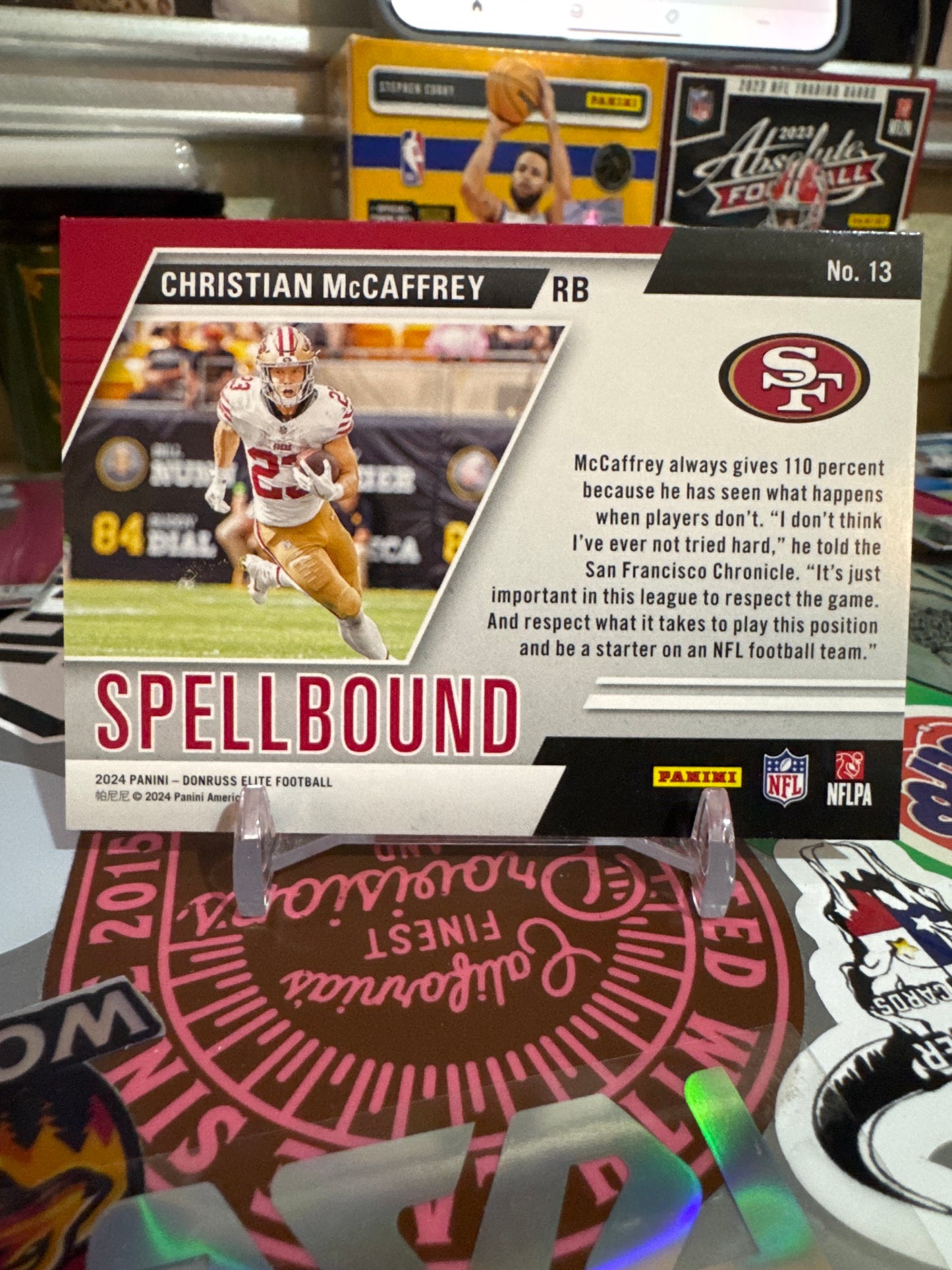 2024 Donruss Elite Spell Bound #13 Christian McCaffrey Pink. Letter C