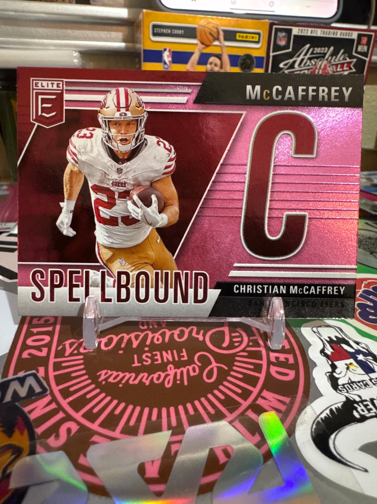 2024 Donruss Elite Spell Bound #13 Christian McCaffrey Pink. Letter C