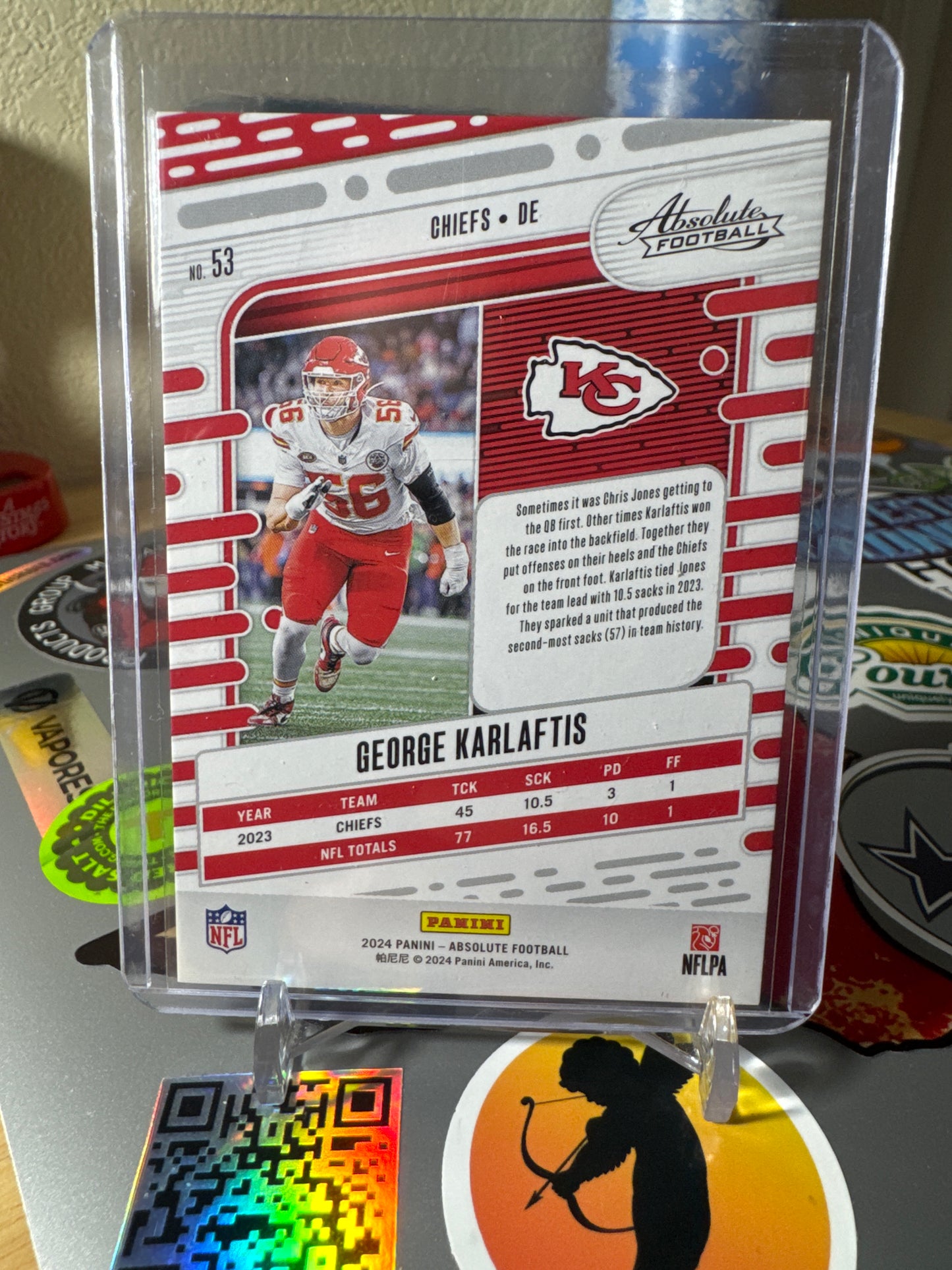 2024 Panini Absolute #53 George Karlaftis- Orange Mosaic Foil Parallel. Numbered 184/299