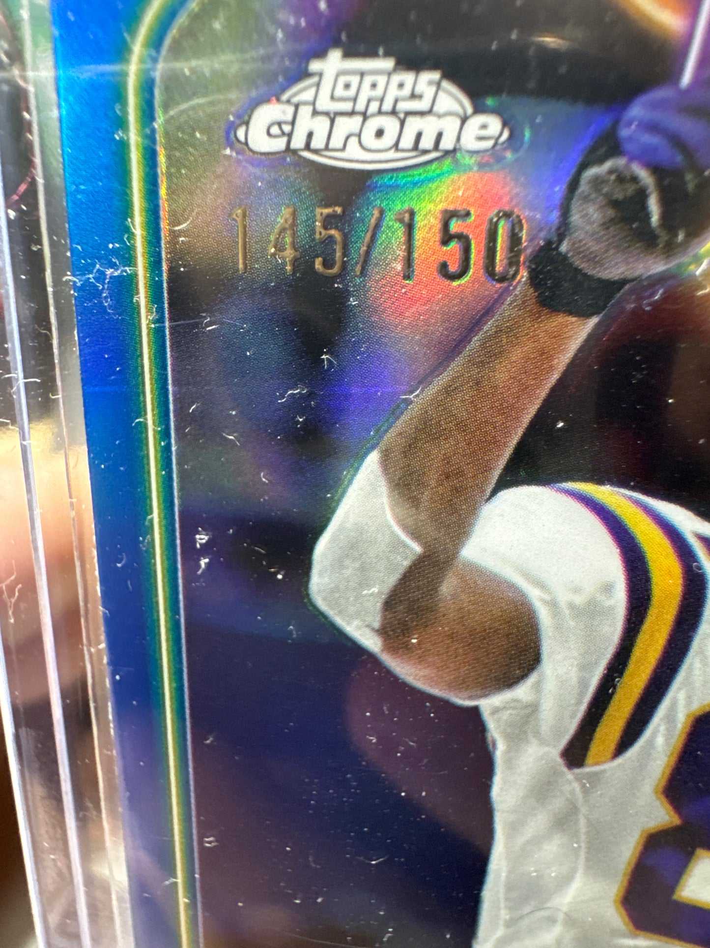 2024 Topps Chrome #112 Randy Moss- Blue Parallel. Numbered 145/150