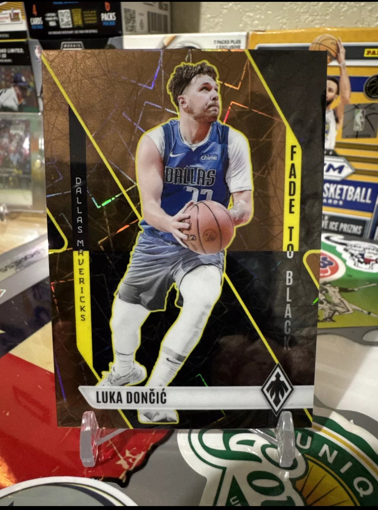 2023 Panini Phoenix- Fade to black #18 Luka Doncic- Bronze Lazer Parallel- Numbered 46/49 Low number. Rare