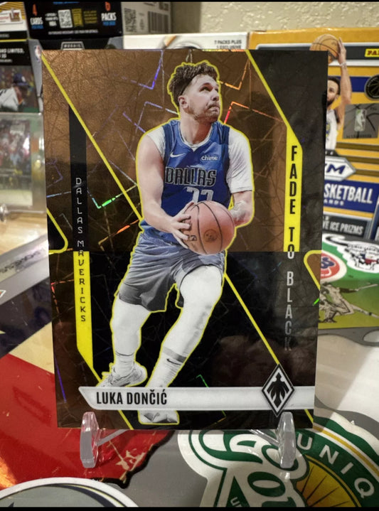 2023 Panini Phoenix- Fade to black #18 Luka Doncic- Bronze Lazer Parallel- Numbered 46/49 Low number. Rare