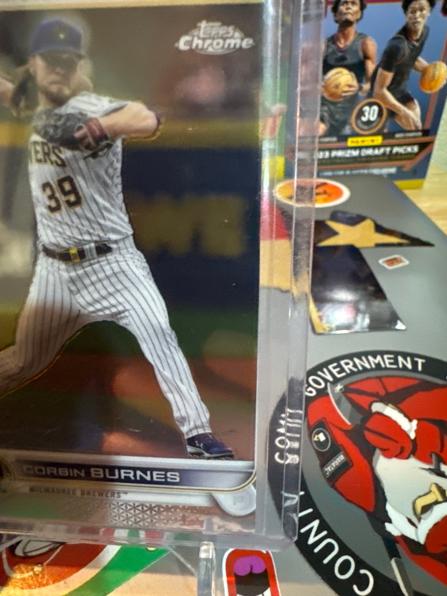 2022 Topps Chrome #167 Corbin Burnes. miss-cut. Cut off on right side part of another partially showing on the left side.