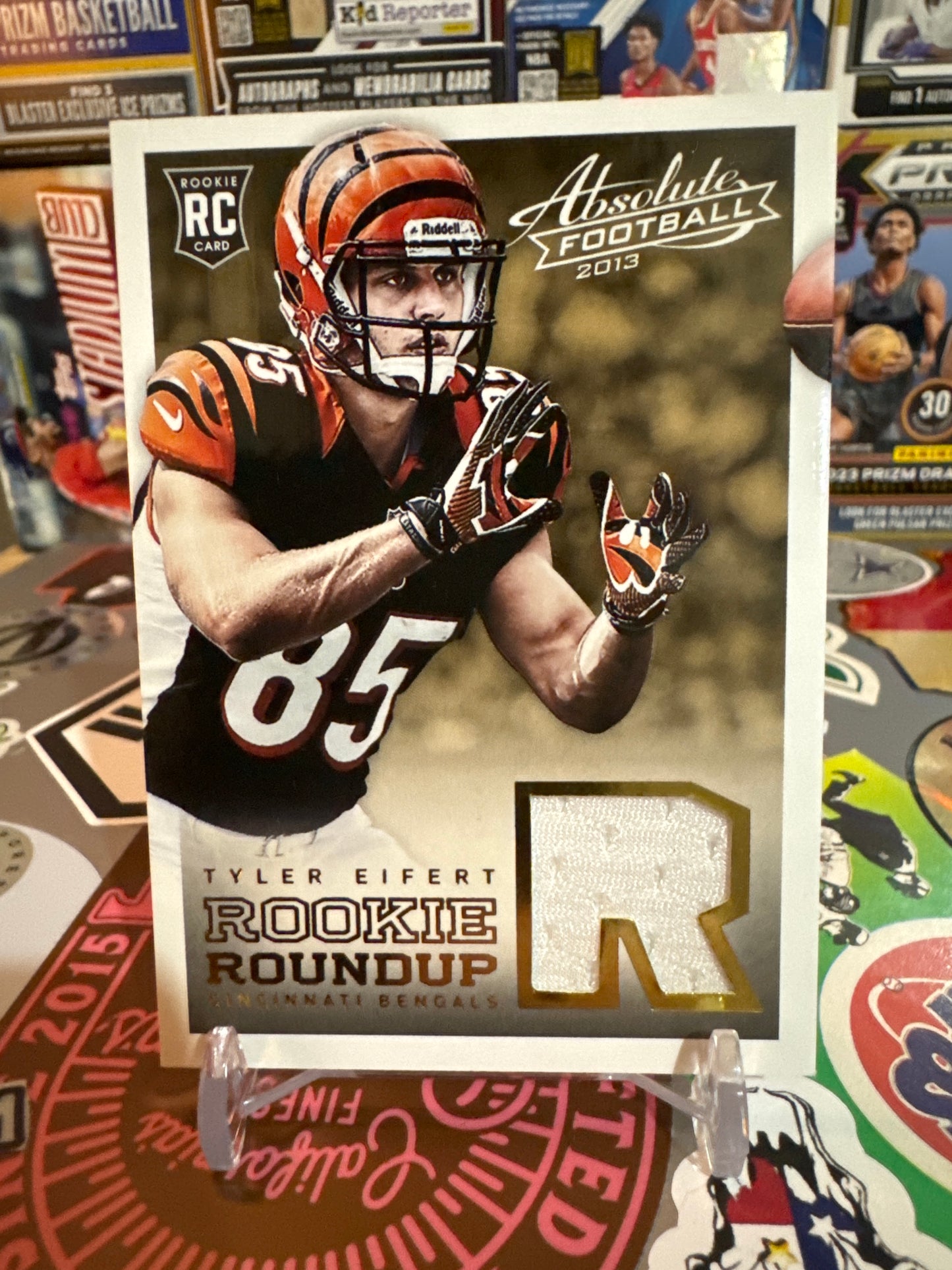 2013 Panini Absolute Rookie Roundup #19. Tyler Eifert. Game worn patch.