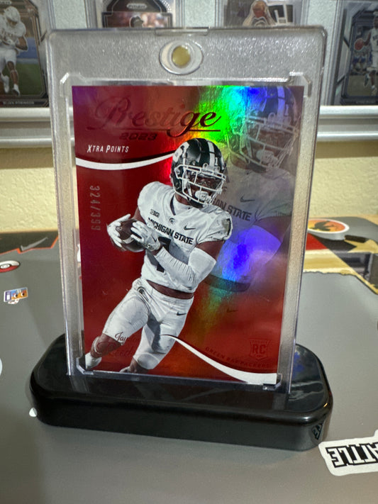 2023 Panini Prestige #348 Jayden Reed. Red XP Premium. RC Numbered. 324/399