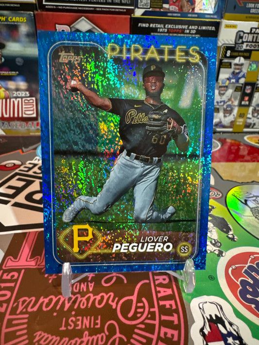 2024 Topps Series 2 #542 Liover Peguero- Blue Shimmer Parallel. Numbered 271/999