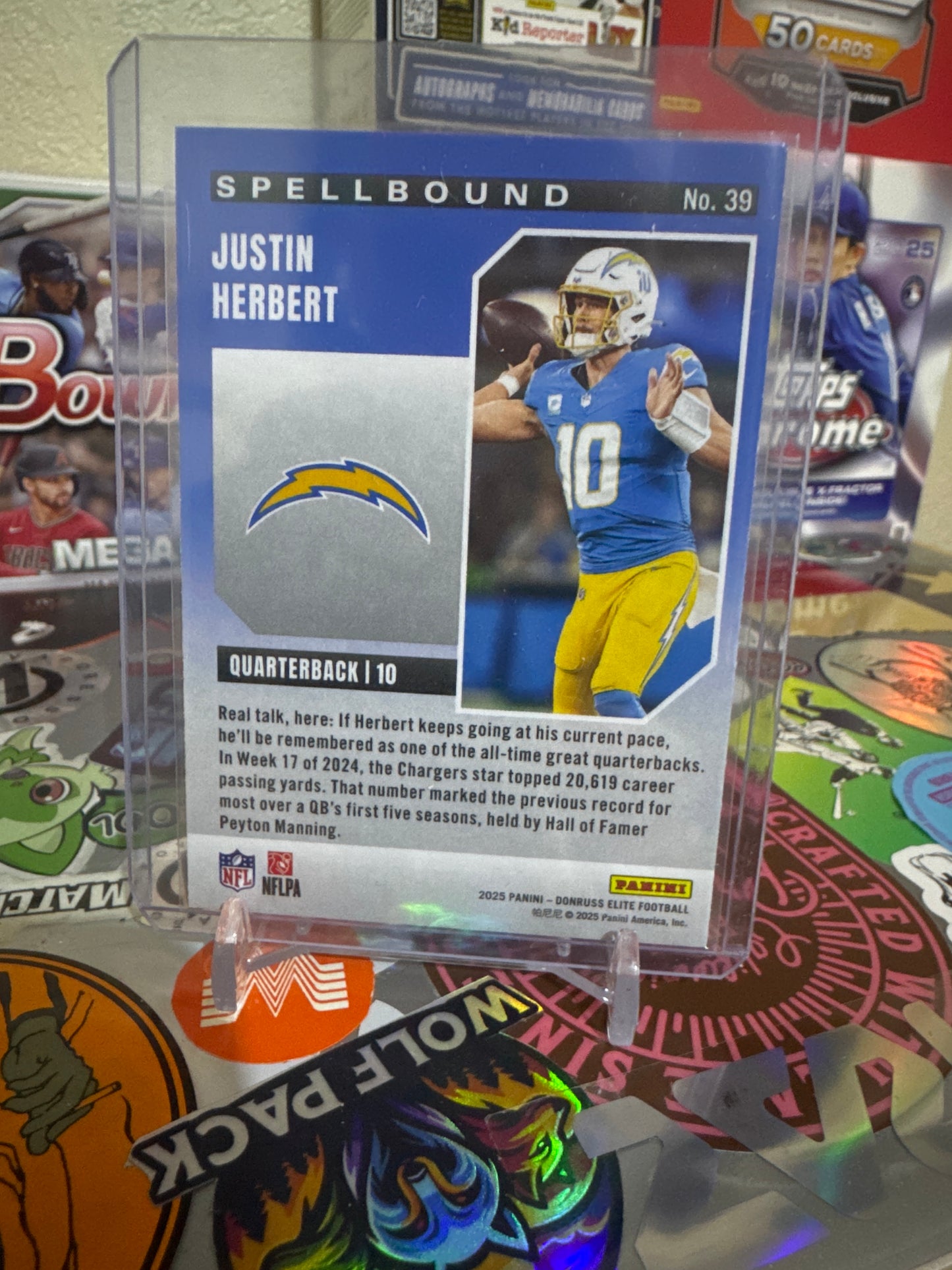 2025 Panini Donruss Elite Spell Bound (letter R) #39 Justin Herbert- Pink Parallel