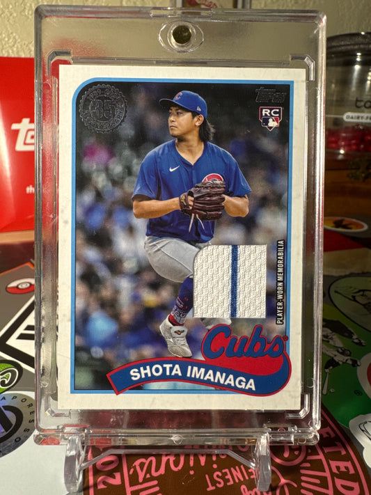2024 Topps Update 1989 variation #89RU-SI Shota Imanaga RC- Player Worn Relic- Centered Pinstripe.
